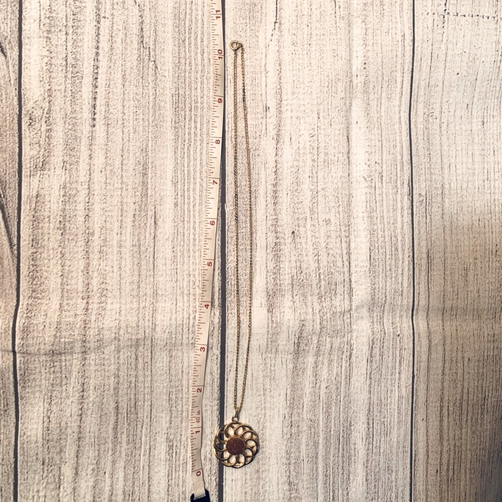 Gold Necklace with Flower Pendant and Brown Stone